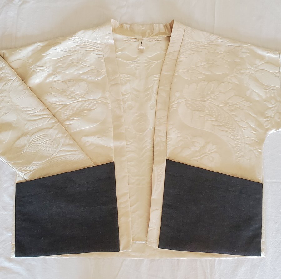 Veste ivoire poche jeans noir